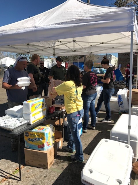 Helping out (food being served)